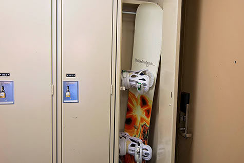 locker with snowboard inside